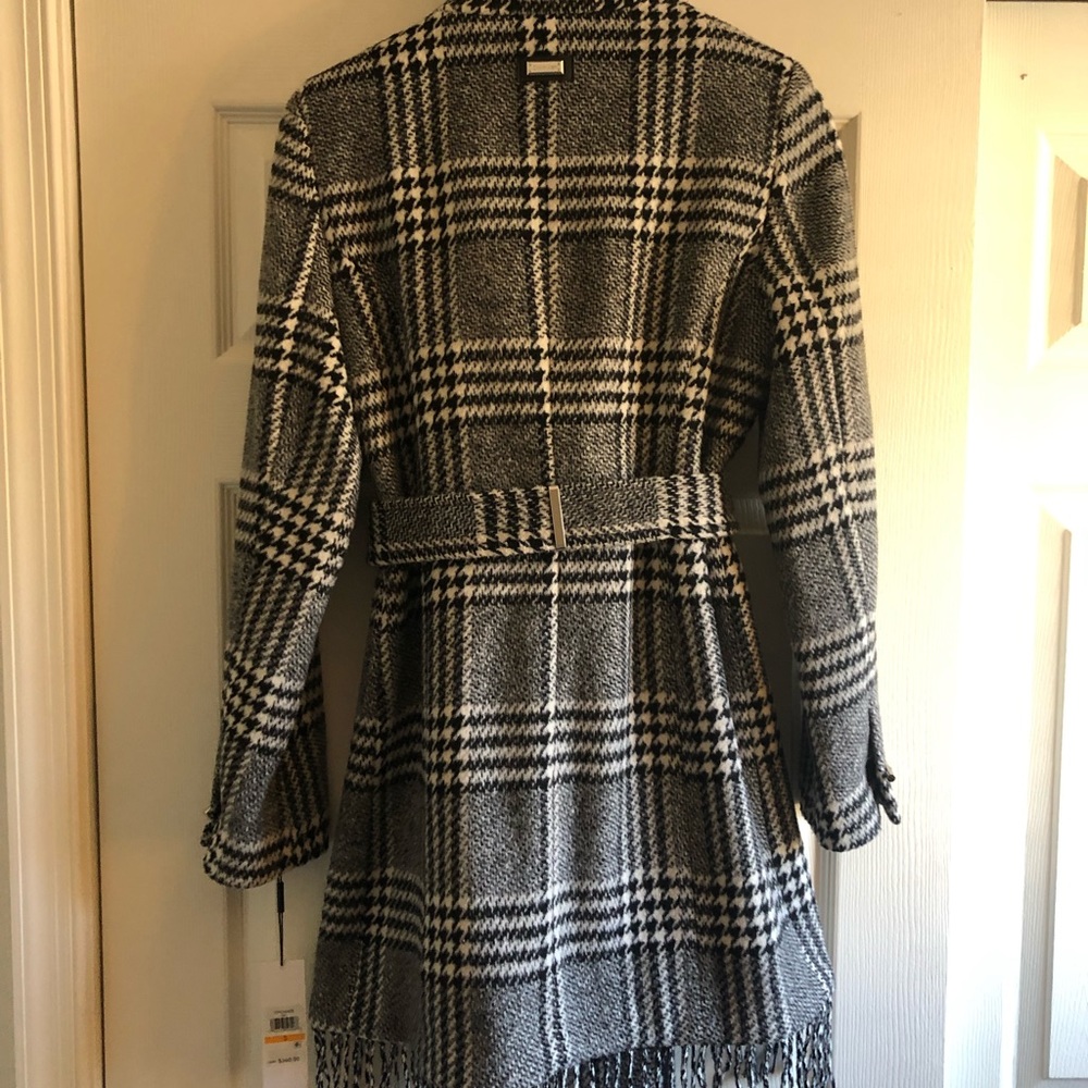 Calvin Klein winter fringe pea coat. NEVER BEEN WORN. NWT